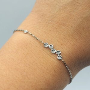 Bracelet or blanc 18 carats, 6 diamants - Mongolie.