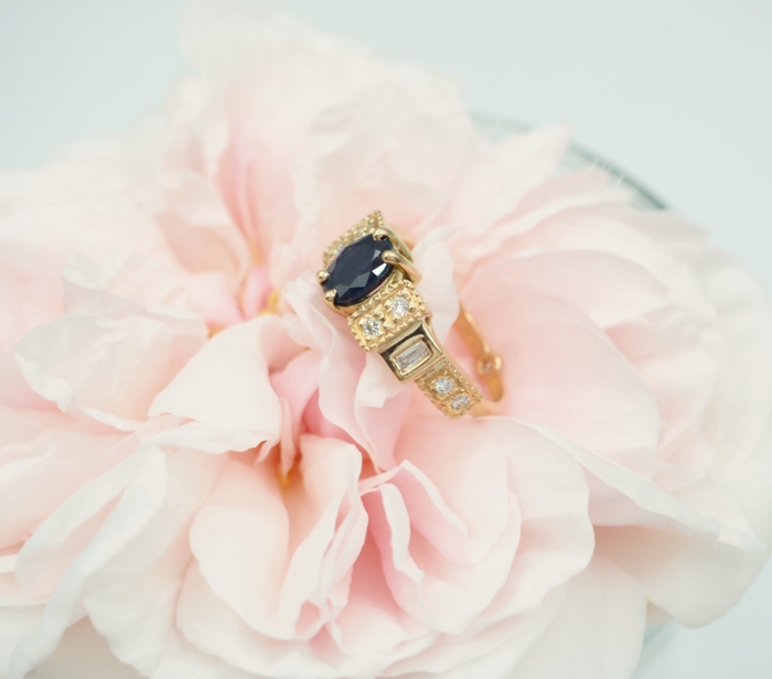 Bague en or rose et saphir 57 Facettes